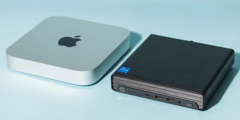 A Mac mini PC and a small-sized Intel-based computer.