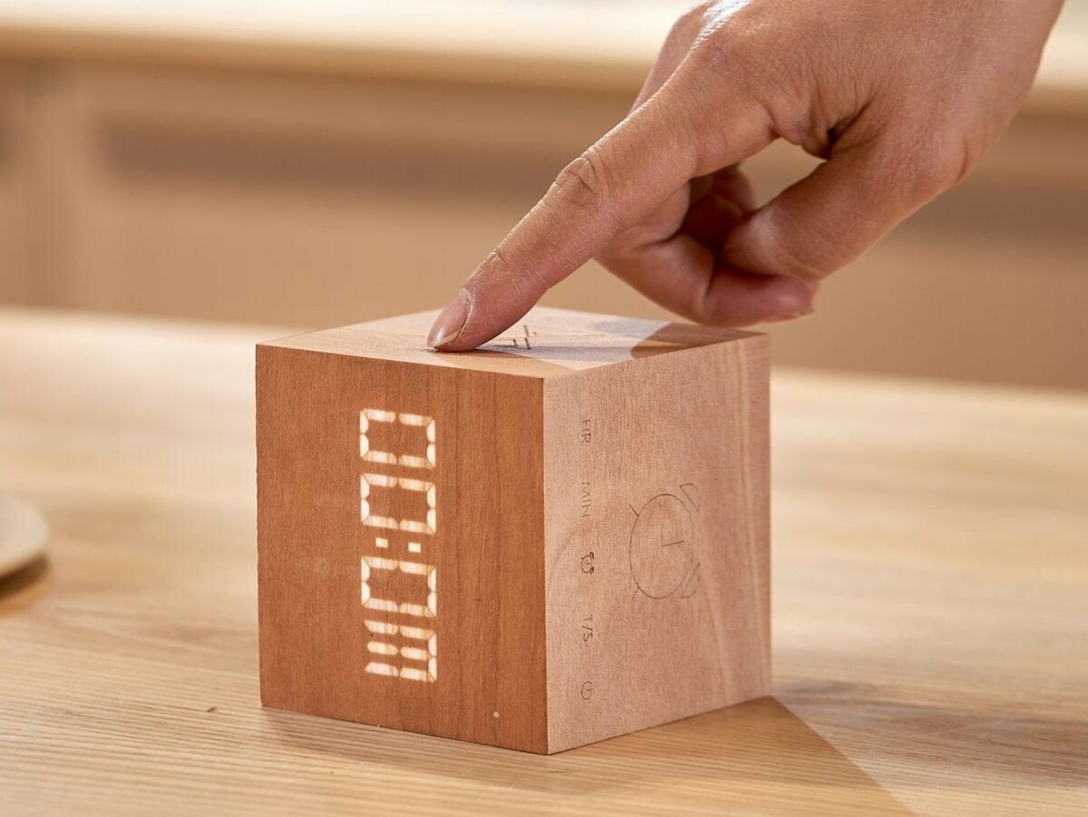 Gingko Cube Plus Clock has a solid wood design and combines a clock, alarm, and stopwatch